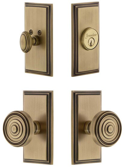 Grandeur Carre Entry Door Set, Keyed Alike with Soleil Knobs in Antique Brass.